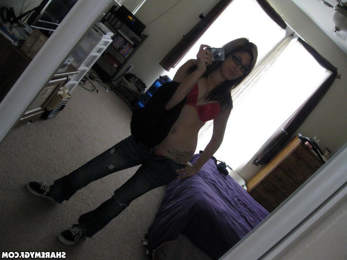 12P Cute girlfriend takes selfshot pictures of her stripping in her bedroom mirror