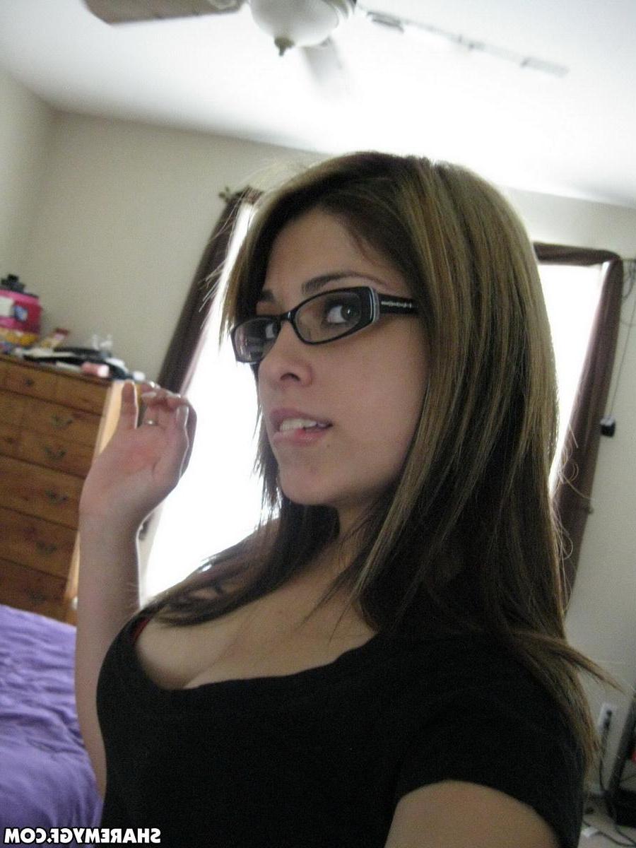 20P Hot coed in glasses takes selfies of her hot body in the bedroom