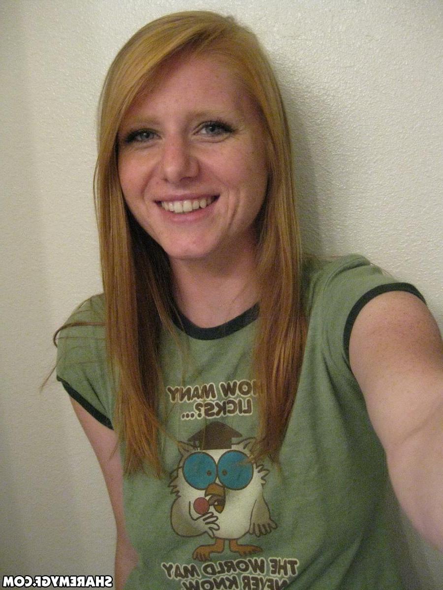 20P Hot college redhead takes selfies of her big natural boobs