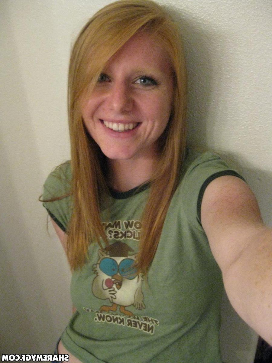 20P Hot college redhead takes selfies of her big natural boobs