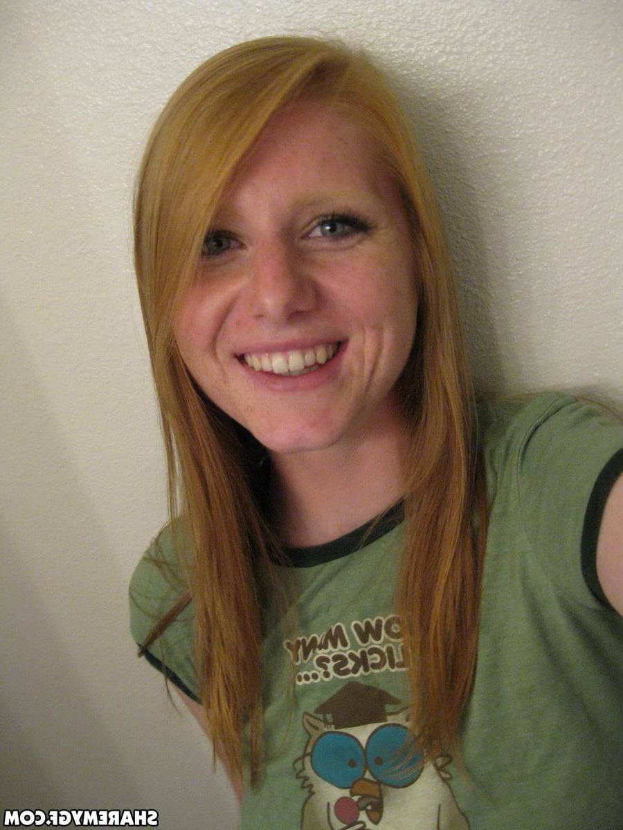 20P Hot college redhead takes selfies of her big natural boobs