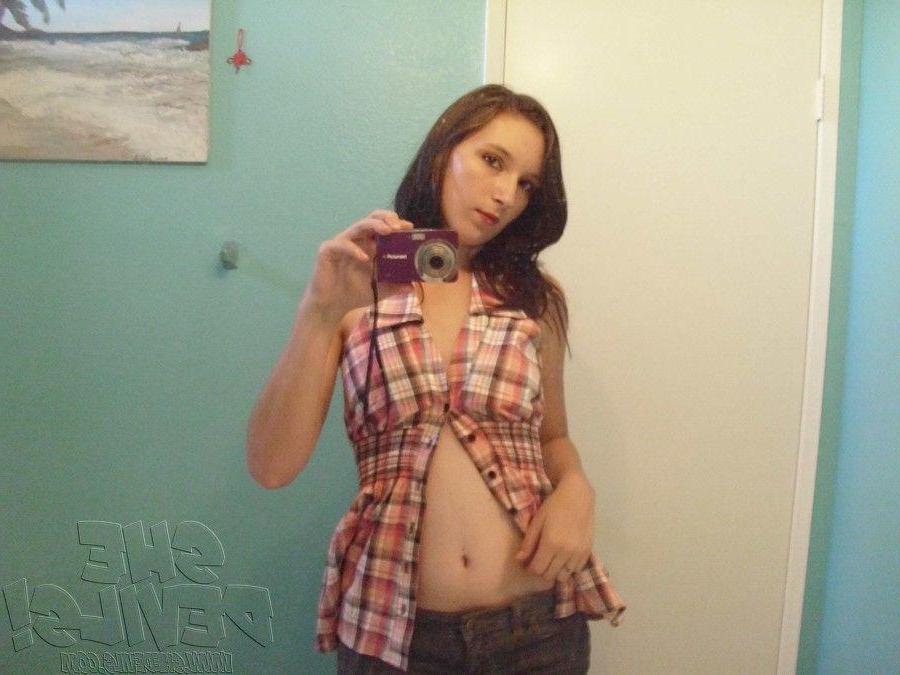 14P Pictures of a horny teen girl with a camera