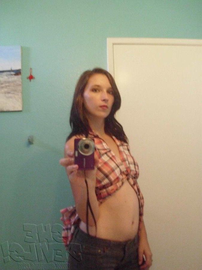 14P Pictures of a horny teen girl with a camera