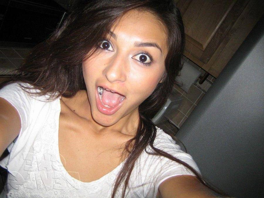 15P Pictures of a hot brunette she-devil naked for you