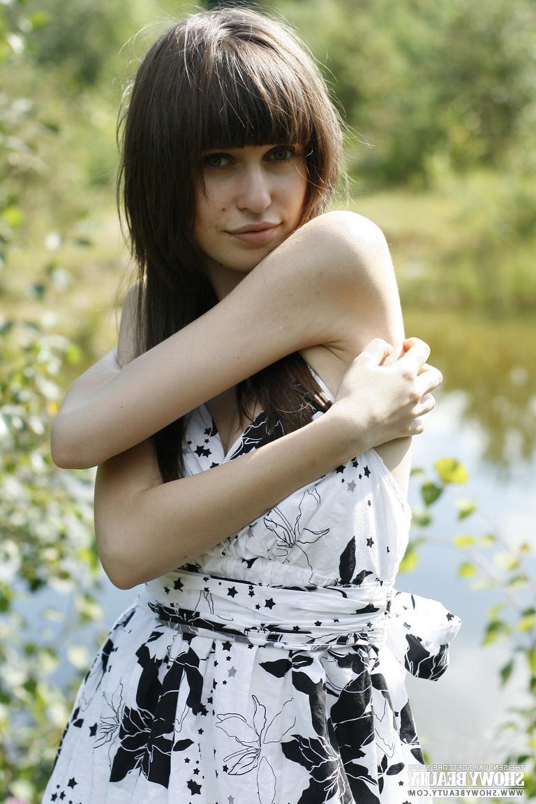 20P Brunette babe Lena lifts her dress outside to show you her tight pussy