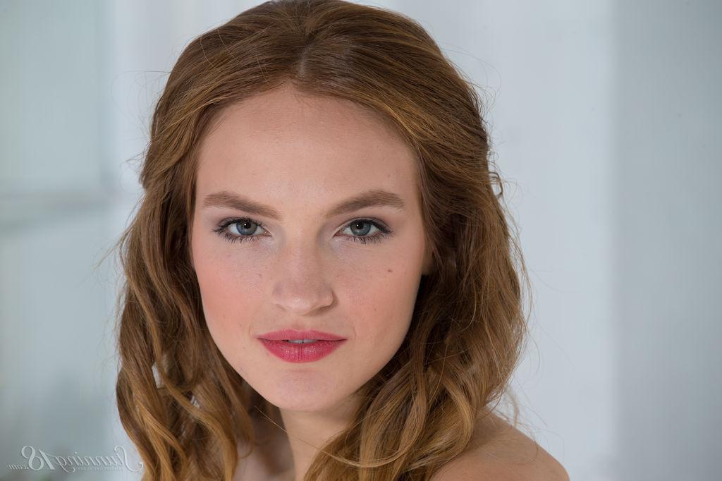 16P Pretty teen Joan strips out of her dress to display her tight nude body