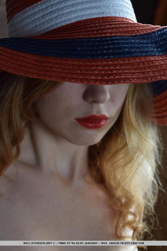 16P Gorgeous blonde May Shelton strips and teases in a vintage inspired set