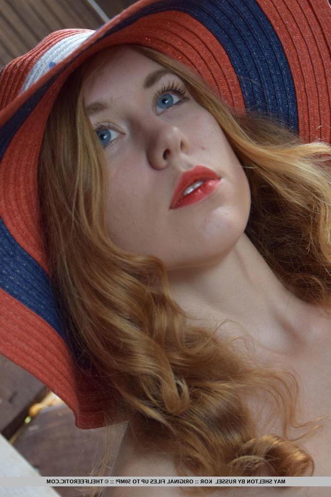 16P Gorgeous blonde May Shelton strips and teases in a vintage inspired set