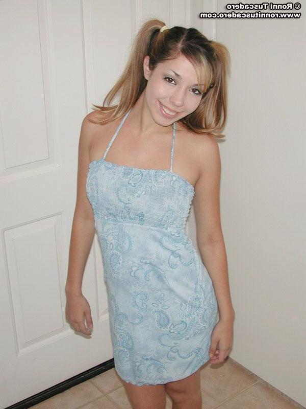 20P Ronni Tuscadero slips off her dress to show you her panties
