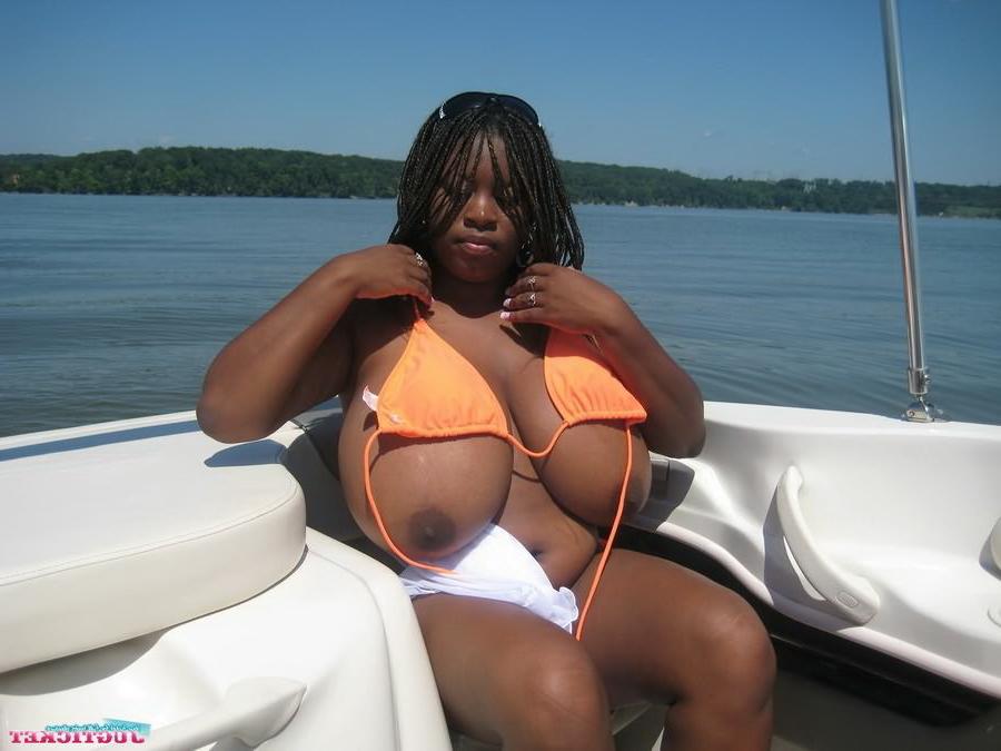 16P Busty fat ebony Mianna Thomas modelling on boat outside