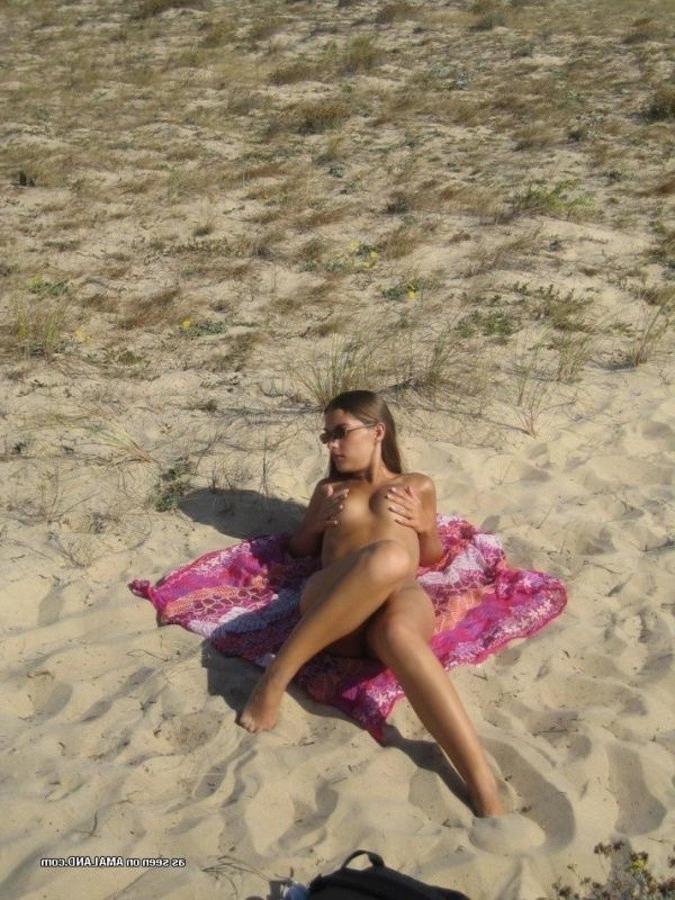 11P Sexy French teen posing nude at the beach
