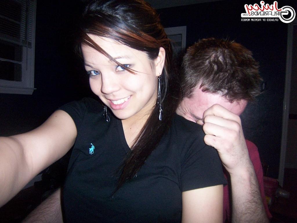 10P Nice oriental girl having fun with camera