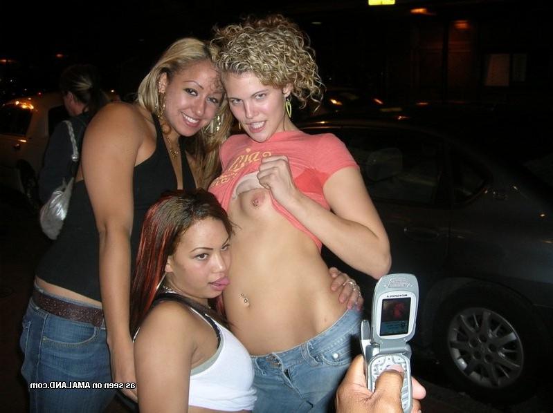 10P Photos of amateur lesbo girls flashing tits