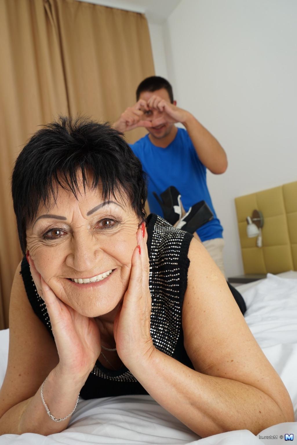 16P Naughty mature lady fooling around with her toy boy