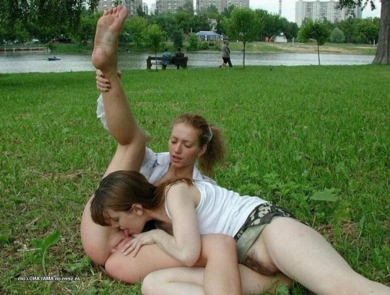 14P Young lesbians enjoying sex in public