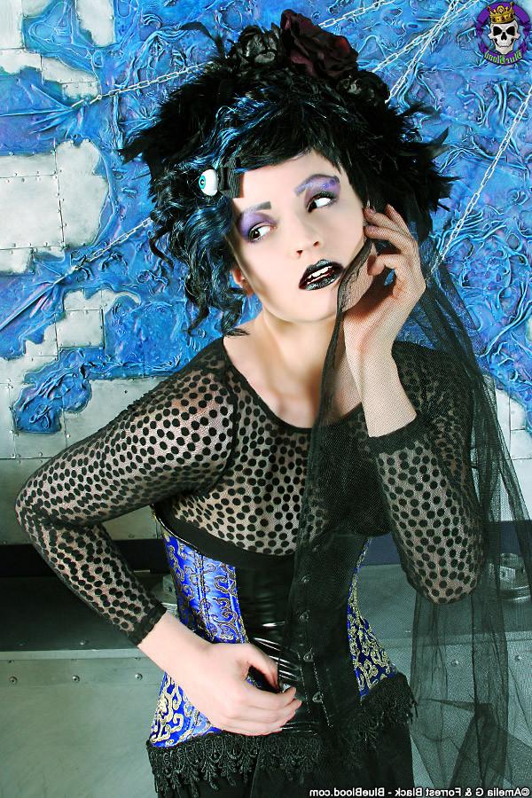 15P Fashionable corsetted Gothic beauty undressed