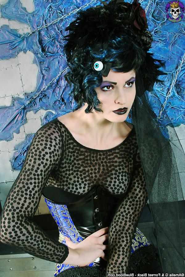 15P Fashionable corsetted Gothic beauty undressed