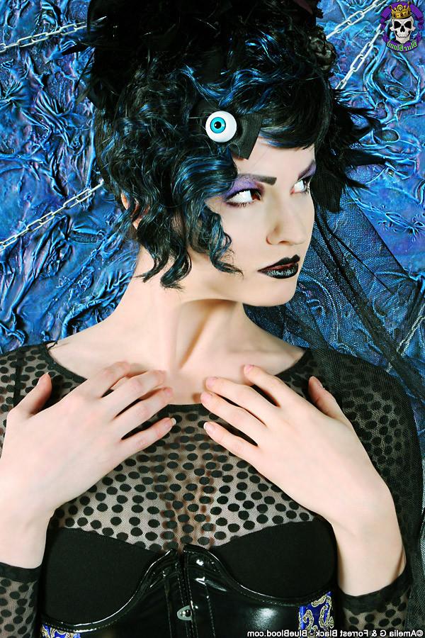 15P Fashionable corsetted Gothic beauty undressed