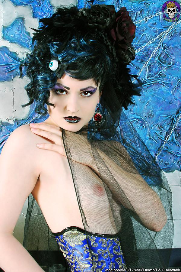 15P Fashionable corsetted Gothic beauty undressed