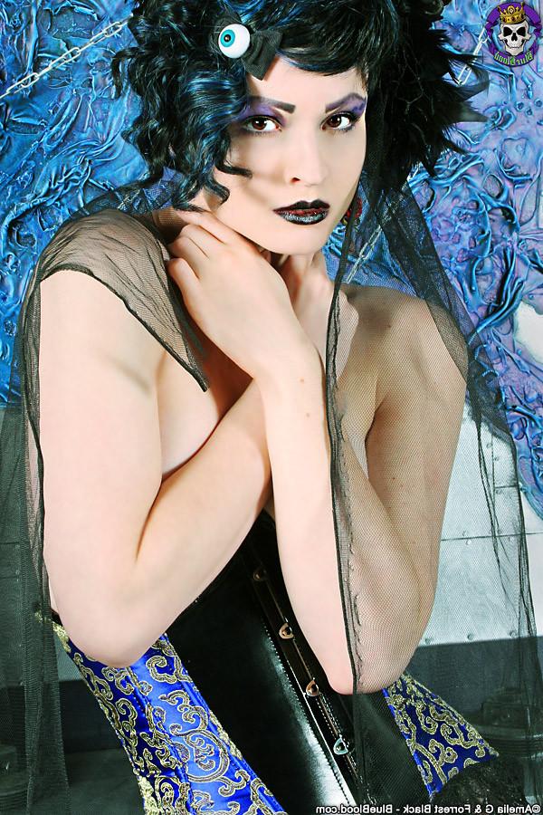 15P Fashionable corsetted Gothic beauty undressed