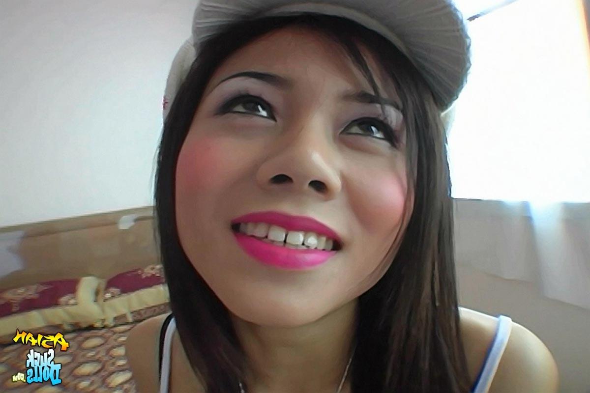 15P Thai teeny bopper Pim sucking a load of cum