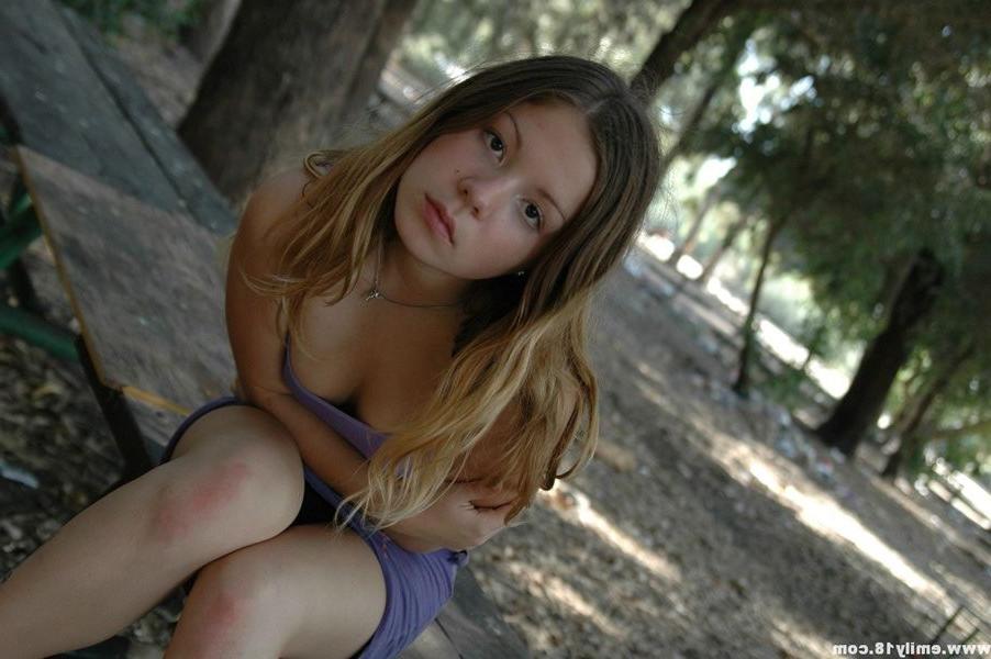 15P Emily having some fun on a picnic table in the park