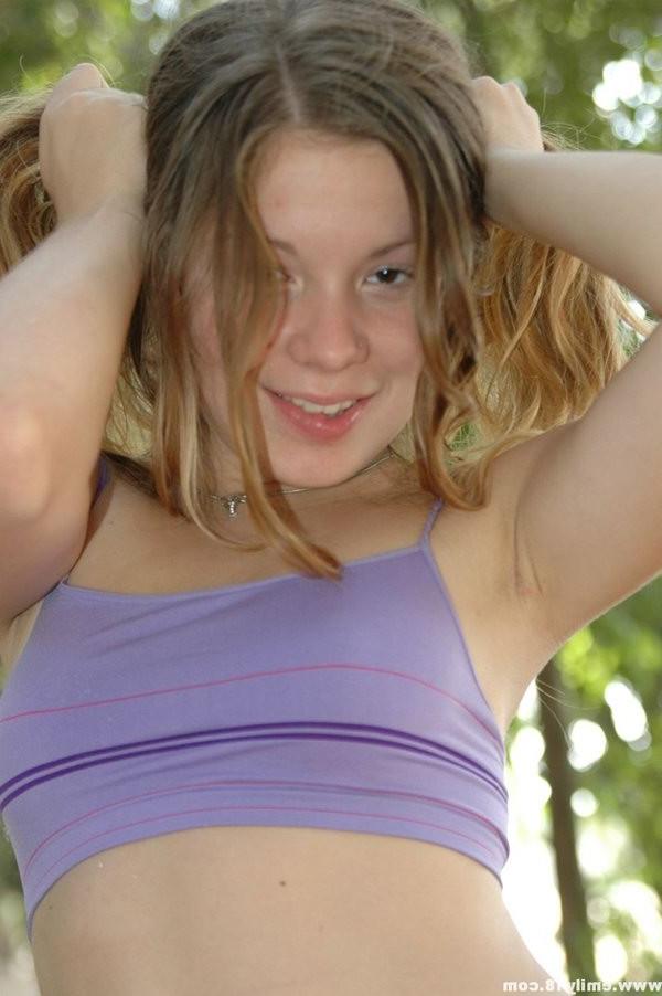 15P Emily having some fun on a picnic table in the park