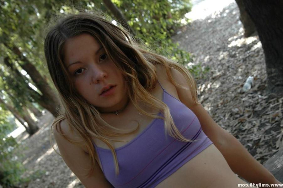 15P Emily having some fun on a picnic table in the park
