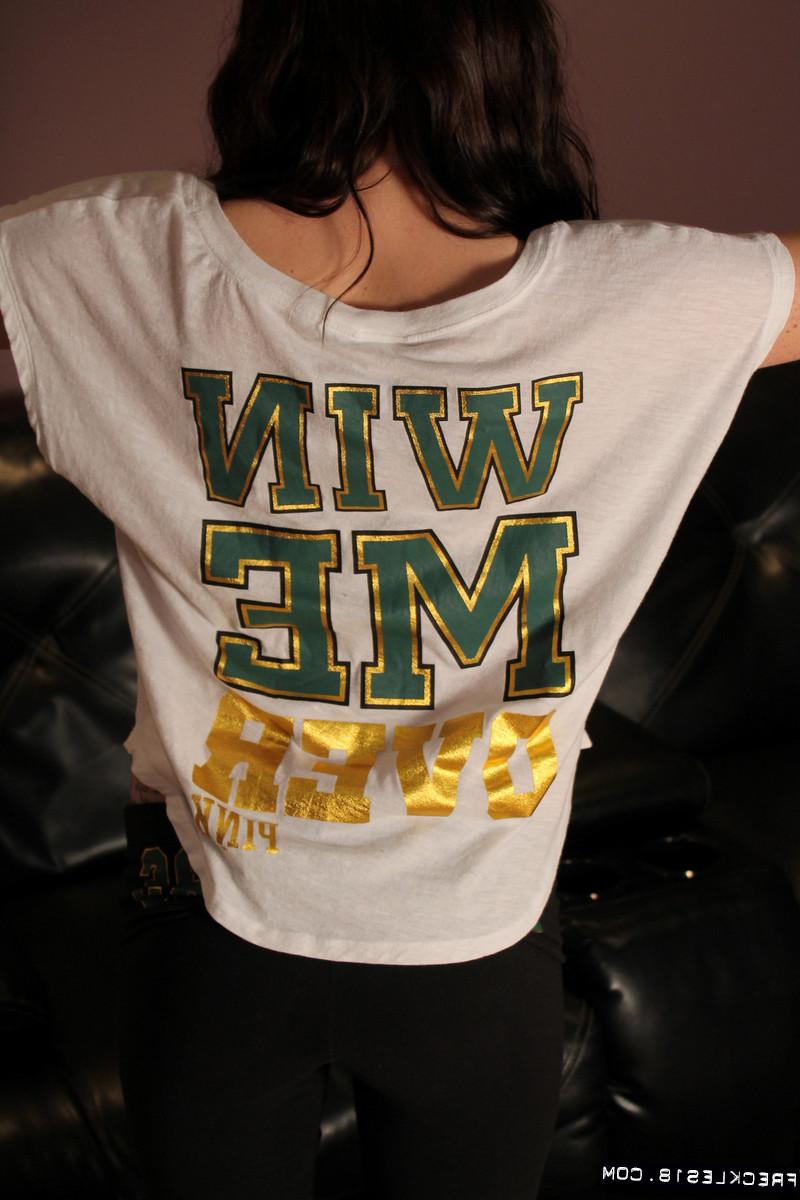 12P Freckled teen football fan