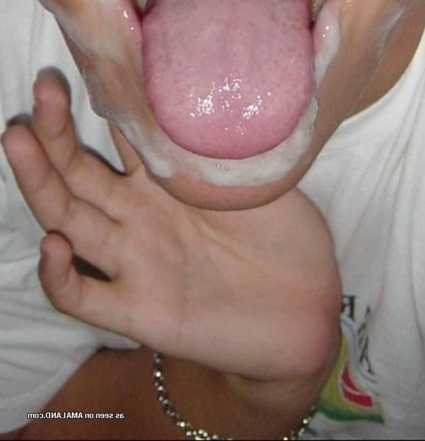 10P Photos of a naughty amateur chick loving the taste of cum