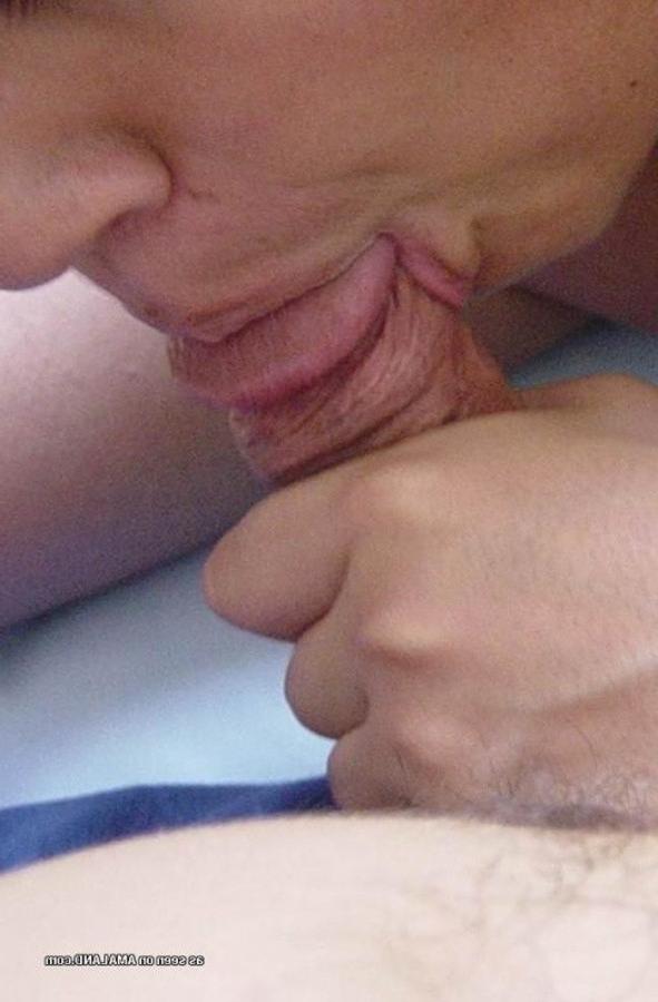 10P Photos of a naughty amateur chick loving the taste of cum