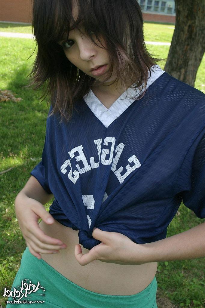 15P Sexy teen model in football jersey