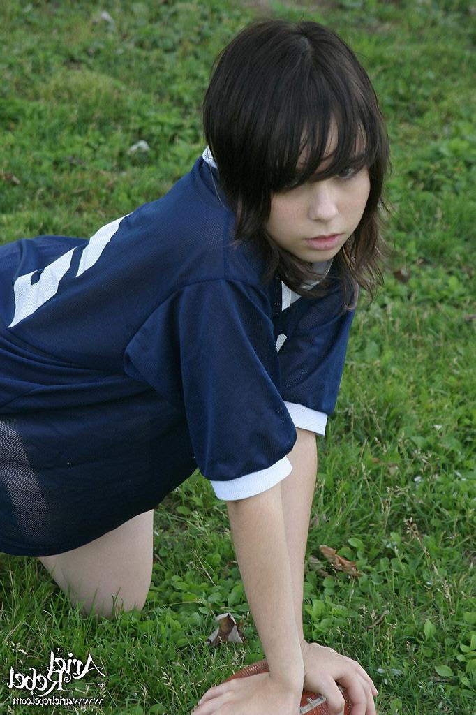 15P Sexy teen model in football jersey