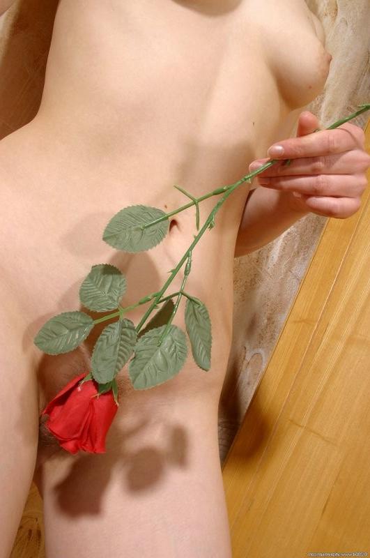 15P Pale skinned blonde poses with her Rose