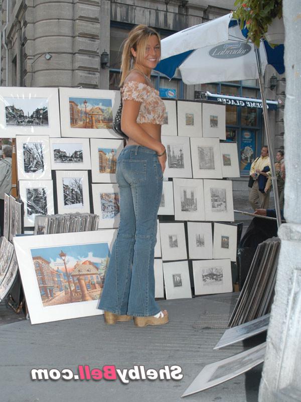 15P Sensual blonde Shelby Bell posing outdoors in blue jeans