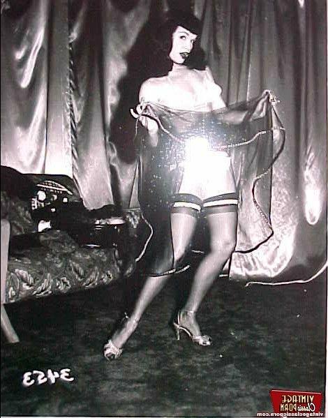 12P Betty Page loves to dance in stockings in a sensual way