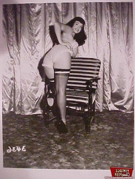 12P Betty Page loves to dance in stockings in a sensual way