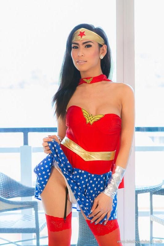 16P Transsexual heroine strips out of her costume and plays with herself