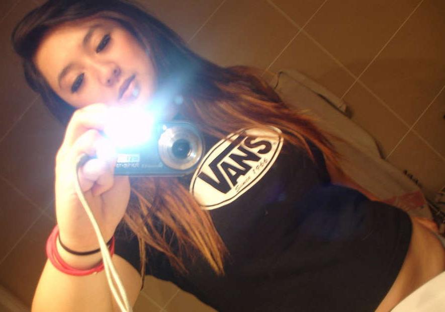 15P Photos of a busty Asian selfshooter