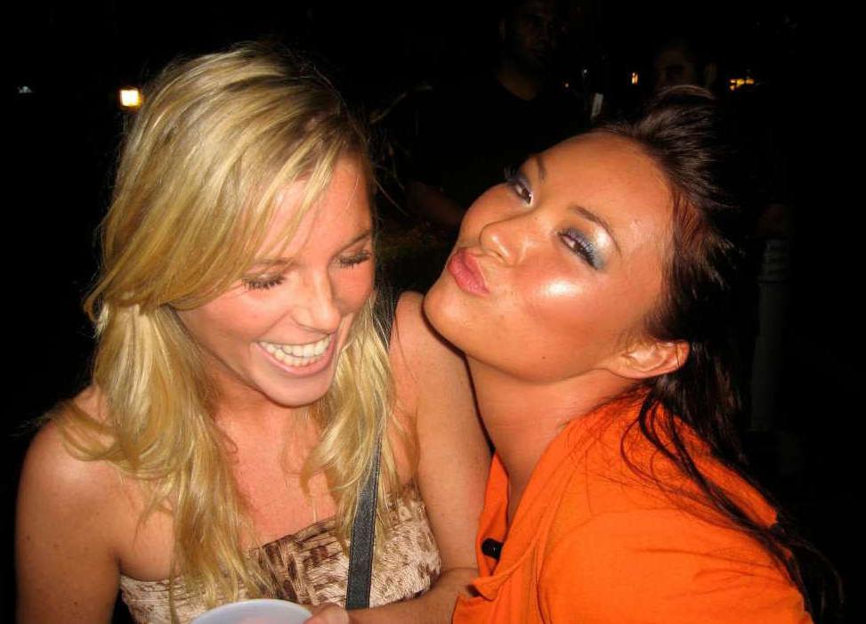 15P Pictures of an Oriental tease posing sexy in a party