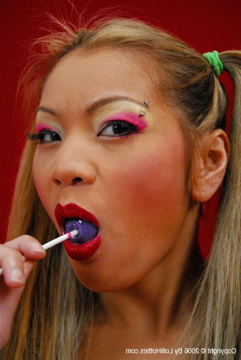 15P Maile sucks a lollipop before she puts it in her pussy 