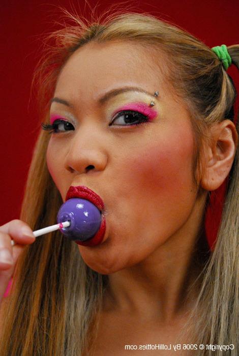 15P Maile sucks a lollipop before she puts it in her pussy 