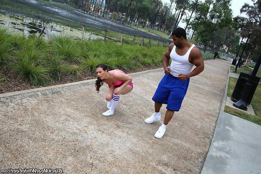 15P Casey Calvert does footjob on her trainer's cock