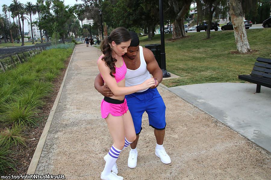 15P Casey Calvert does footjob on a black cock