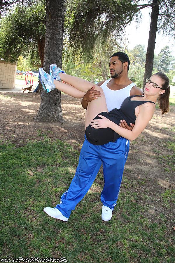 15P Brooklyn Chase does footjob on a black dick