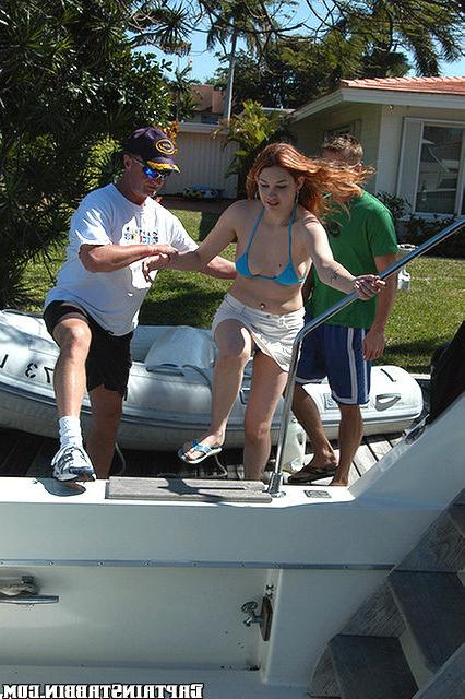 15P The captian fish hooks a redhead for a blow on the boat