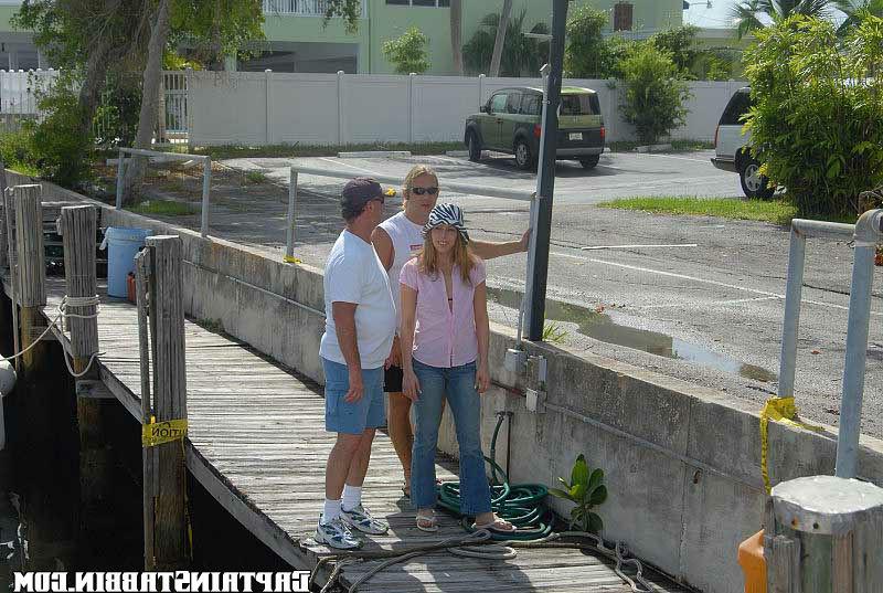 15P Hot amatuer babe gets busted and tossed off a boat here in these pics