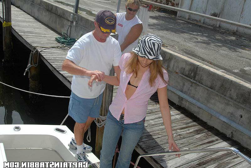15P Hot amatuer babe gets busted and tossed off a boat here in these pics
