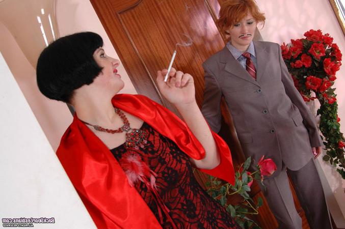 20P Lesbian gal in male suit having rubber rod in her trousers for ass-drilling