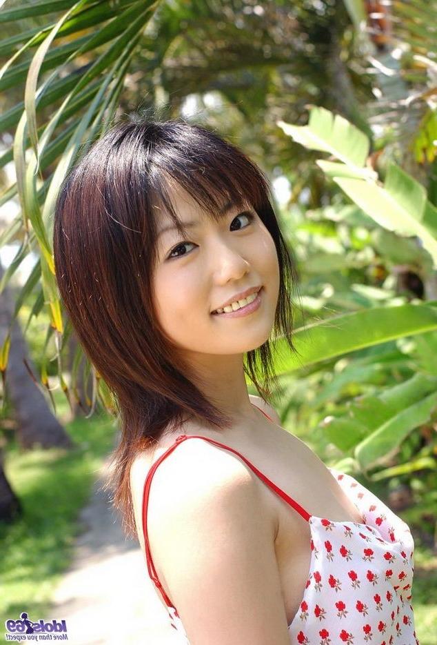 15P Japanese beauty Saki Ninomiya in bikini on a beach